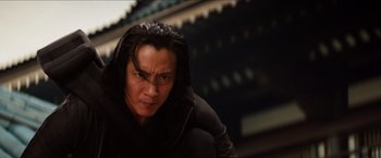 Movie still from “The Wolverine” (2013), directed by James Mangold – A person with long black hair; Close Up shot, Low angle