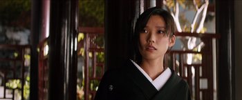 Movie still from “The Wolverine” (2013), directed by James Mangold – A young woman in a black and white kimono; Close Up shot, Low angle