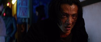 Movie still from “The Wolverine” (2013), directed by James Mangold – A person with long black hair; Close Up shot, Low angle