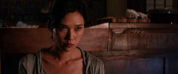 Movie still from “The Wolverine” (2013), directed by James Mangold – A young woman is looking into the camera; Close Up shot, Over the shoulder angle