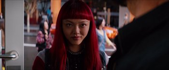 Movie still from “The Wolverine” (2013), directed by James Mangold – A woman with red hair is looking at the camera; Close Up shot, Over the shoulder angle