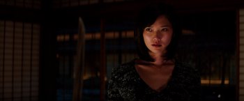 Movie still from “The Wolverine” (2013), directed by James Mangold – A woman in a dark room with a knife in her hand; Close Up shot, Over the shoulder angle