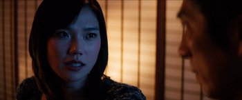 Movie still from “The Wolverine” (2013), directed by James Mangold – A woman's face in front of a window; Close Up shot, Low angle