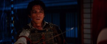 Movie still from “The Wolverine” (2013), directed by James Mangold – A man in a samurai outfit is holding a sword; Close Up shot, Low angle