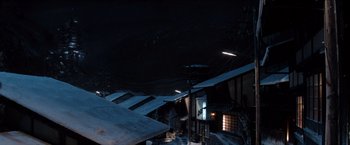 Movie still from “The Wolverine” (2013), directed by James Mangold – A view of a building at night from the ground; Extreme Wide shot, Low angle