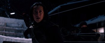 Movie still from “The Wolverine” (2013), directed by James Mangold – A man in black jacket standing next to a wall at night; Close Up shot, Low angle