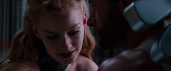 Movie still from “The Wolverine” (2013), directed by James Mangold – A man and a woman face to face in a dark room; Close Up shot, Over the shoulder angle