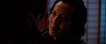 Movie still from “The Wolverine” (2013), directed by James Mangold – A person looking at the camera; Close Up shot, Over the shoulder angle