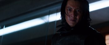 Movie still from “The Wolverine” (2013), directed by James Mangold – A person with long black hair; Close Up shot, Low angle