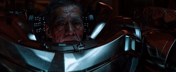 Movie still from “The Wolverine” (2013), directed by James Mangold – An old man with a beard is sitting in a chair; Close Up shot, Low angle