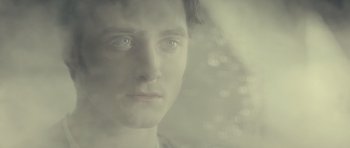 Movie still from “The Woman in Black” (2012), directed by James Watkins – A person's face in front of a window; Close Up shot, High angle