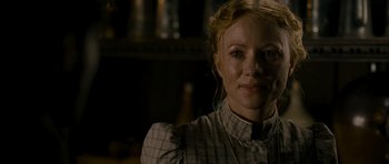 Movie still from “The Woman in Black” (2012), directed by James Watkins – A person wearing a dress; Close Up shot, Over the shoulder angle