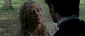 Movie still from “The Woman in Black” (2012), directed by James Watkins – An older woman and a younger man looking at each other; Close Up shot, Over the shoulder angle