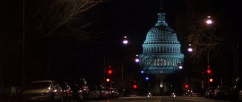 Movie still from “The X Files” (1998), directed by Rob Bowman – A view of the united states capitol building at night; Extreme Wide shot, Low angle