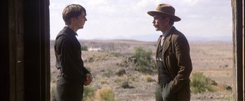 Movie still from “There Will Be Blood” (2007), directed by Paul Thomas Anderson – Medium shot, Over the shoulder angle