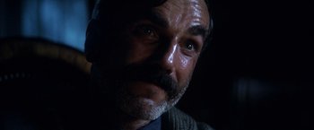 Movie still from “There Will Be Blood” (2007), directed by Paul Thomas Anderson – A person with a beard; Close Up shot, Low angle