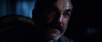 Movie still from “There Will Be Blood” (2007), directed by Paul Thomas Anderson – A person with a mustache; Close Up shot, Low angle