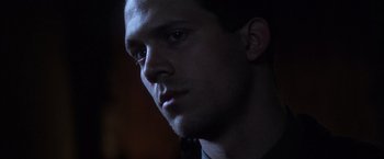 Movie still from “There Will Be Blood” (2007), directed by Paul Thomas Anderson – A man's face in the dark; Close Up shot, Low angle