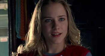 Movie still from “Thirteen” (2003), directed by Catherine Hardwicke – A person with long blonde hair; Close Up shot, Low angle