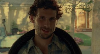 Movie still from “Thirteen” (2003), directed by Catherine Hardwicke – A person wearing a plaid shirt; Close Up shot, Low angle