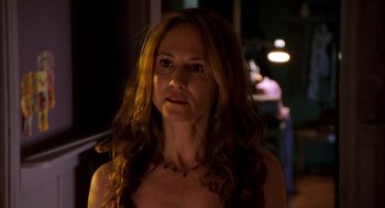 Movie still from “Thirteen” (2003), directed by Catherine Hardwicke – A person with long hair; Close Up shot, Over the shoulder angle