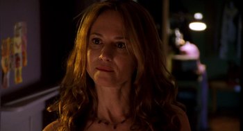 Movie still from “Thirteen” (2003), directed by Catherine Hardwicke – A person with long hair; Close Up shot, Over the shoulder angle