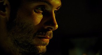 Movie still from “Thirteen” (2003), directed by Catherine Hardwicke – A person with a beard; Extreme Close Up shot, Low angle
