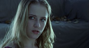 Movie still from “Thirteen” (2003), directed by Catherine Hardwicke – A person with long blonde hair; Close Up shot, Low angle