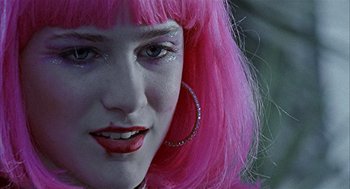 Movie still from “Thirteen” (2003), directed by Catherine Hardwicke – A person wearing a pink wig; Close Up shot, Over the shoulder angle
