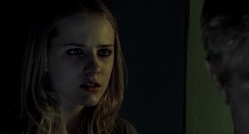 Movie still from “Thirteen” (2003), directed by Catherine Hardwicke – A young woman with long blonde hair stares into the camera; Close Up shot, Low angle