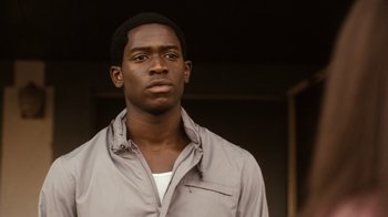 Movie still from “Snowfall” (2017), directed by Hiro Murai – A person wearing a jacket; Close Up shot, Low angle