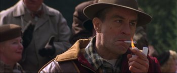 Movie still from “This Boy's Life” (1993), directed by Michael Caton-Jones – A person wearing a hat and jacket; Close Up shot, Low angle