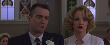Movie still from “This Boy's Life” (1993), directed by Michael Caton-Jones – A man and a woman standing next to each other; Close Up shot, Low angle