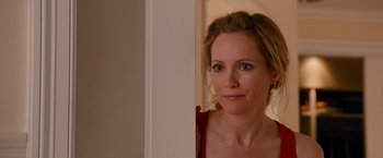 Movie still from “This Is 40” (2012), directed by Judd Apatow – A person standing in front of a wall; Close Up shot, Over the shoulder angle