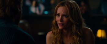 Movie still from “This Is 40” (2012), directed by Judd Apatow – A person sitting in a room; Close Up shot, Over the shoulder angle