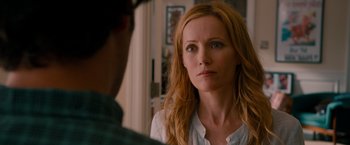 Movie still from “This Is 40” (2012), directed by Judd Apatow – A person with long red hair; Close Up shot, Over the shoulder angle