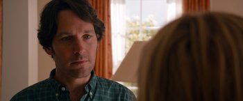 Movie still from “This Is 40” (2012), directed by Judd Apatow – A person looking at a mirror; Close Up shot, Over the shoulder angle