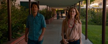 Movie still from “This Is 40” (2012), directed by Judd Apatow – A man and a woman walking down a sidewalk; Medium shot, Over the shoulder angle