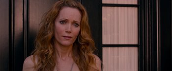 Movie still from “This Is 40” (2012), directed by Judd Apatow – A person with long red hair; Close Up shot, Over the shoulder angle