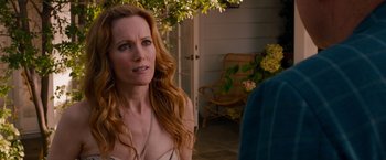 Movie still from “This Is 40” (2012), directed by Judd Apatow – A woman standing in front of another woman; Close Up shot, Over the shoulder angle