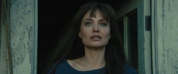 Movie still from “Those Who Wish Me Dead” (2021), directed by Taylor Sheridan – A person with long black hair; Close Up shot, Low angle