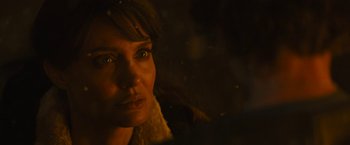 Movie still from “Those Who Wish Me Dead” (2021), directed by Taylor Sheridan – A woman's face in the dark; Close Up shot, Over the shoulder angle
