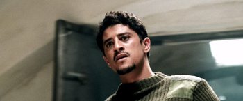 Movie still from “Three Kings” (1999), directed by David O. Russell – A person with a beard; Close Up shot, Low angle