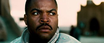 Movie still from “Three Kings” (1999), directed by David O. Russell – A man's face with water droplets on it; Close Up shot, Low angle