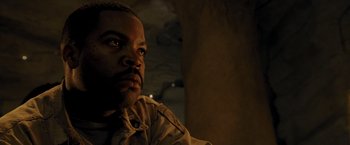 Movie still from “Three Kings” (1999), directed by David O. Russell – A person wearing a jacket; Close Up shot, Low angle