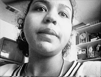 Movie still from “Time” (2020), directed by Garrett Bradley – A black - and - white photo of a woman's face; Extreme Close Up shot, High angle