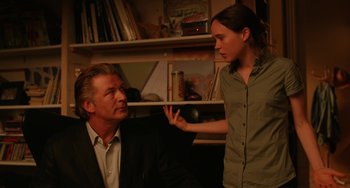 Movie still from “To Rome with Love” (2012), directed by Woody Allen – A man and a woman are talking in a living room; Medium shot, Over the shoulder angle