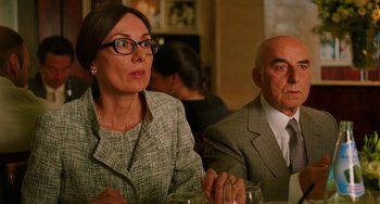 Movie still from “To Rome with Love” (2012), directed by Woody Allen – A woman and a man sitting at a dinner table; Close Up shot, Over the shoulder angle