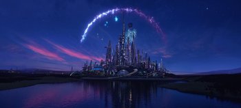 Movie still from “Tomorrowland” (2015), directed by Brad Bird – A futuristic city is shown at night with lights; Extreme Wide shot, High angle