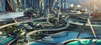 Movie still from “Tomorrowland” (2015), directed by Brad Bird – An aerial view of a futuristic city with roads and buildings; Extreme Wide shot, High angle